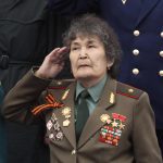 Ряжена під "тричі Героя" з колорадською стрічкою